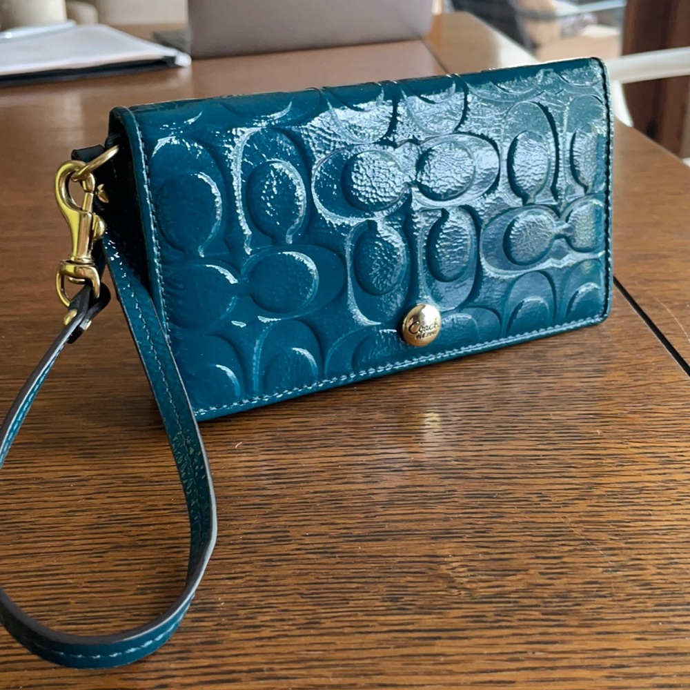 Teal COACH leather wallet with strap